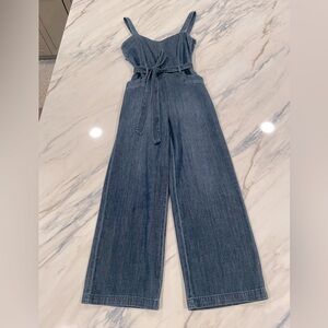 PAIGE Blue Denim Jumpsuit with Wide-Leg Design Size S.